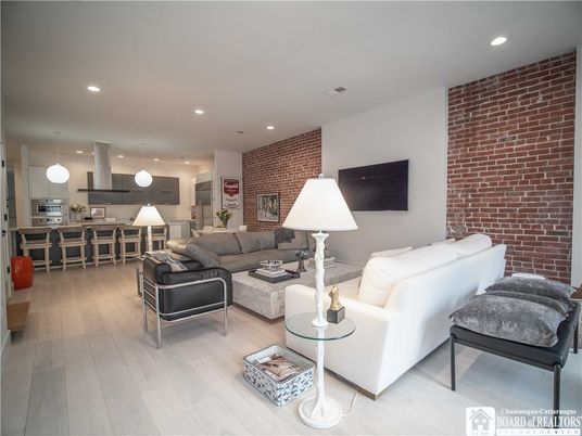 Interior, Kitchen, Living room, Pendant Lights, Recessed Lighting, Stainless Steel Appliances, Stone Walls, Wood Texture Flooring