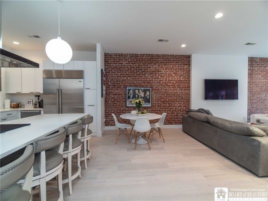 Dining room, Fireplace, Interior, Kitchen, Living room, Pendant Lights, Recessed Lighting, Stainless Steel Appliances, Stone Walls, Wood Texture Flooring