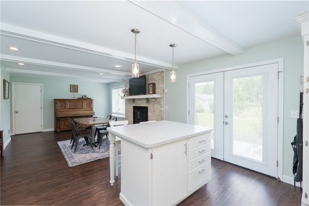 Dining room, Fireplace, Interior, Pendant Lights, Recessed Lighting, Wood Texture Flooring