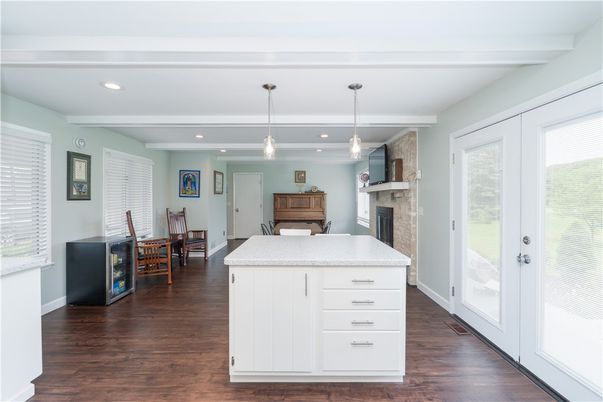 Dining room, Fireplace, Interior, Kitchen, Pendant Lights, Recessed Lighting, Wood Texture Flooring