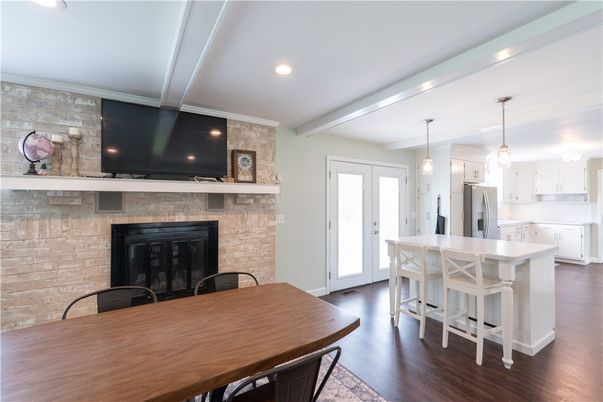 Fireplace, Interior, Kitchen, Pendant Lights, Recessed Lighting, Stone Walls, Wood Texture Flooring