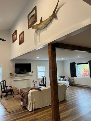 Bedroom, Fireplace, Interior, Recessed Lighting, Wood Texture Flooring