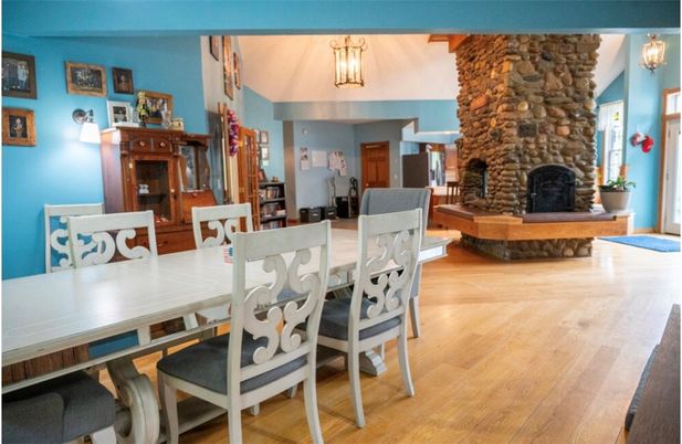 Dining room, Fireplace, Interior, Pendant Lights, Wood Texture Flooring