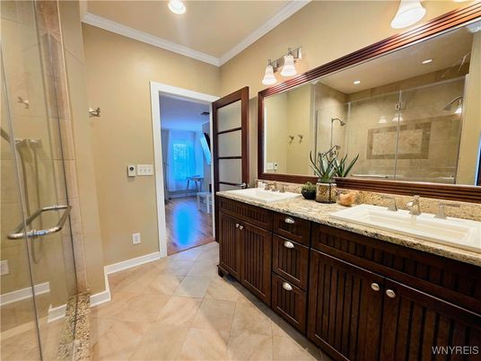Bathroom, Dual Sink Vanities, Glass Shower, Interior, Recessed Lighting, Wood Texture Flooring