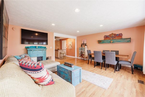 Dining room, Fireplace, Interior, Living room, Recessed Lighting, Wood Texture Flooring