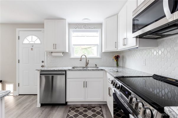 Interior, Kitchen, Recessed Lighting, Stainless Steel Appliances, Wood Texture Flooring