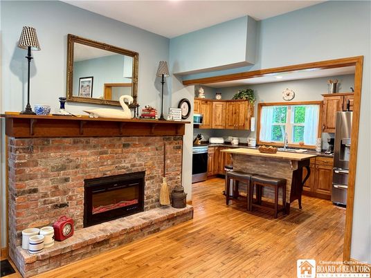 Fireplace, Interior, Kitchen, Recessed Lighting, Stone Walls, Wood Texture Flooring