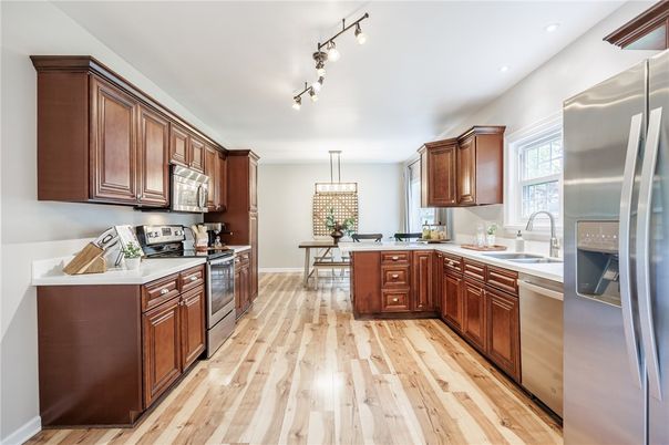 Dining room, Interior, Kitchen, Pendant Lights, Recessed Lighting, Stainless Steel Appliances, Wood Texture Flooring