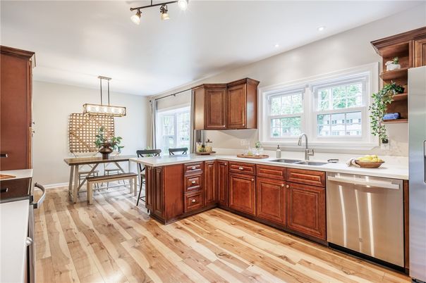 Dining room, Interior, Kitchen, Pendant Lights, Recessed Lighting, Stainless Steel Appliances, Wood Texture Flooring