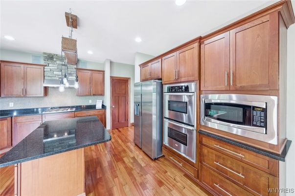 Interior, Kitchen, Pendant Lights, Recessed Lighting, Stainless Steel Appliances, Wood Texture Flooring