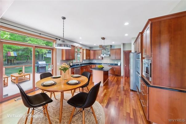 Dining room, Interior, Kitchen, Pendant Lights, Recessed Lighting, Stainless Steel Appliances, Wood Texture Flooring