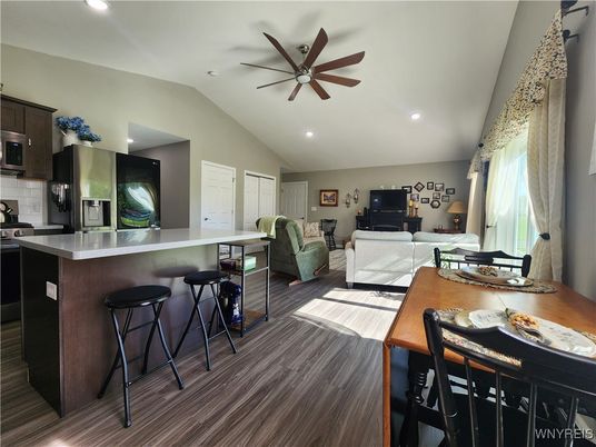 Dining room, Interior, Kitchen, Living room, Recessed Lighting, Stainless Steel Appliances, Wood Texture Flooring