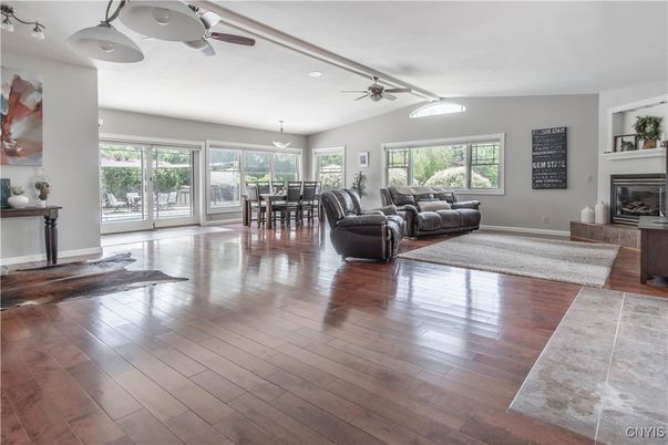 Dining room, Fireplace, Interior, Living room, Pendant Lights, Wood Texture Flooring