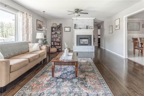 Dining room, Fireplace, Interior, Living room, Pendant Lights, Wood Texture Flooring