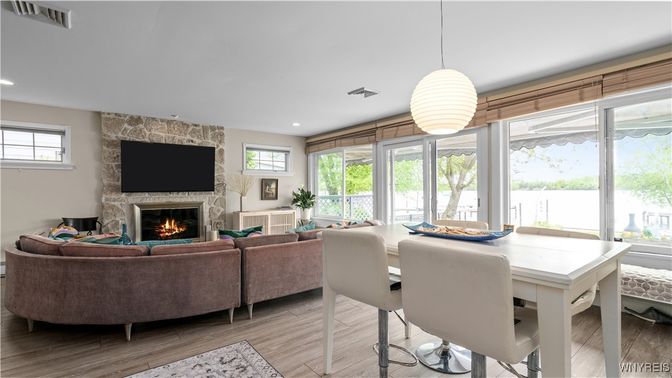 Dining room, Fireplace, Interior, Living room, Pendant Lights, Recessed Lighting, Stone Walls, Wood Texture Flooring