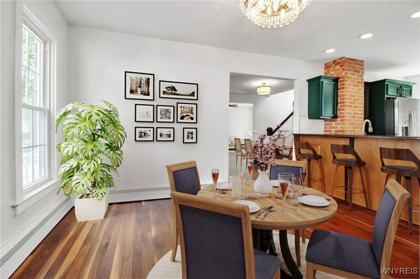 Dining room, Fireplace, Interior, Recessed Lighting, Stone Walls, Wood Texture Flooring