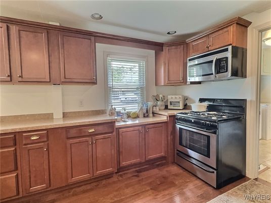 Interior, Kitchen, Recessed Lighting, Stainless Steel Appliances, Wood Texture Flooring