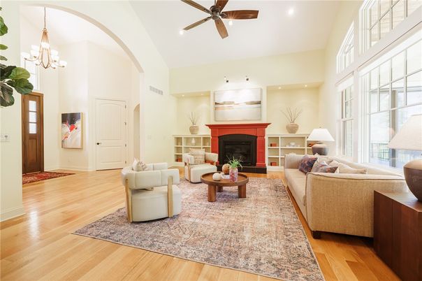 Chandelier, Fireplace, Interior, Living room, Pendant Lights, Recessed Lighting, Wood Texture Flooring