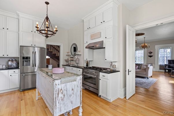 Chandelier, Interior, Kitchen, Pendant Lights, Stainless Steel Appliances, Wood Texture Flooring