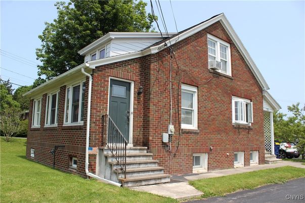 Exterior, Facade, Brick Facade, Cape Cod