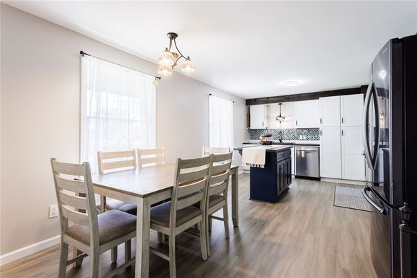 Dining room, Interior, Kitchen, Pendant Lights, Stainless Steel Appliances, Wood Texture Flooring