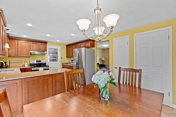 Chandelier, Dining room, Interior, Kitchen, Pendant Lights, Recessed Lighting, Stainless Steel Appliances