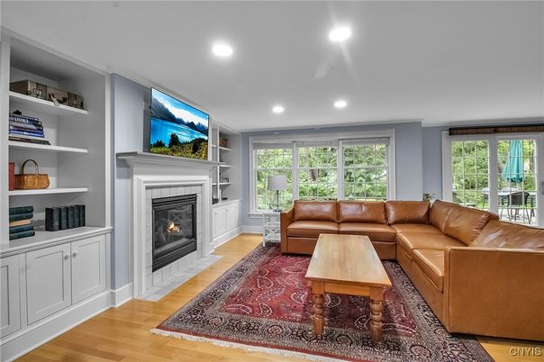 Fireplace, Interior, Living room, Recessed Lighting, Wood Texture Flooring