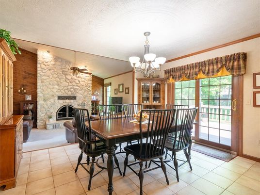 Chandelier, Dining room, Fireplace, Interior, Stone Walls