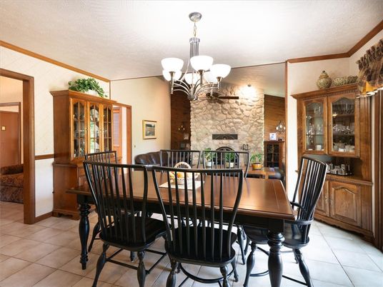 Chandelier, Dining room, Fireplace, Interior, Stone Walls