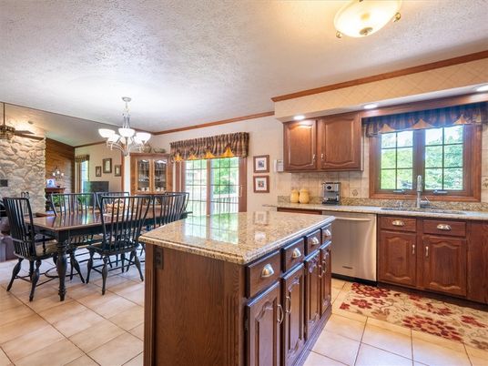Chandelier, Dining room, Interior, Kitchen, Stainless Steel Appliances, Stone Walls