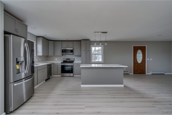 Interior, Kitchen, Pendant Lights, Recessed Lighting, Stainless Steel Appliances, Wood Texture Flooring