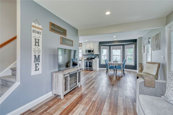 Dining room, Interior, Kitchen, Living room, Recessed Lighting, Stainless Steel Appliances, Wood Texture Flooring