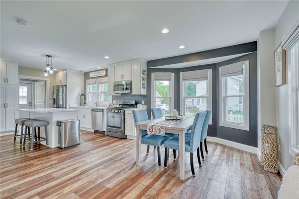 Dining room, Interior, Kitchen, Pendant Lights, Recessed Lighting, Stainless Steel Appliances, Wood Texture Flooring