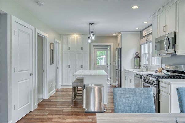 Interior, Kitchen, Pendant Lights, Recessed Lighting, Stainless Steel Appliances, Wood Texture Flooring