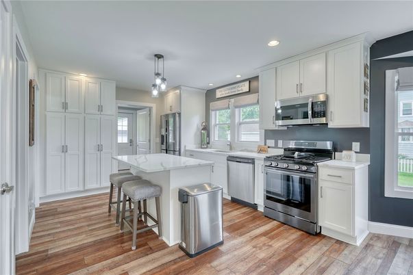 Interior, Kitchen, Pendant Lights, Recessed Lighting, Stainless Steel Appliances, Wood Texture Flooring