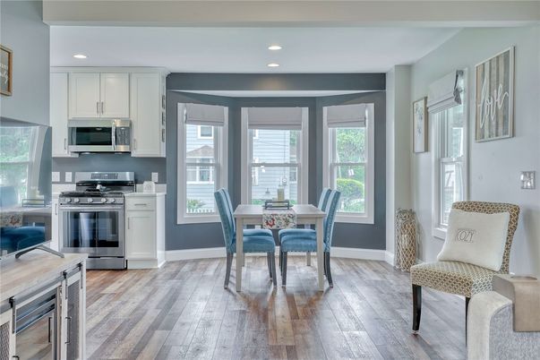 Dining room, Interior, Kitchen, Recessed Lighting, Stainless Steel Appliances, Wood Texture Flooring