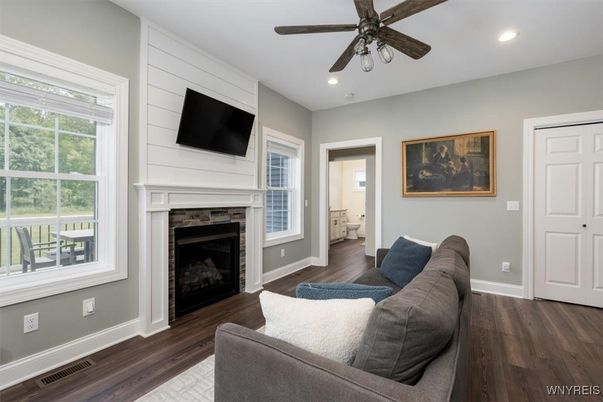 Fireplace, Interior, Living room, Recessed Lighting, Wood Texture Flooring