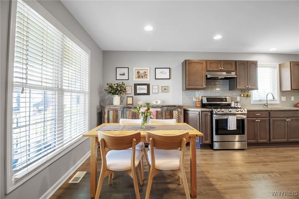 Dining room, Interior, Kitchen, Recessed Lighting, Stainless Steel Appliances, Wood Texture Flooring
