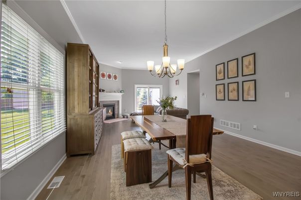 Chandelier, Dining room, Fireplace, Interior, Wood Texture Flooring