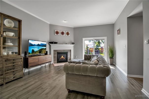 Fireplace, Interior, Living room, Recessed Lighting, Wood Texture Flooring