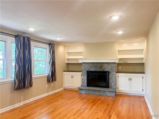Empty room, Fireplace, Interior, Recessed Lighting, Wood Texture Flooring