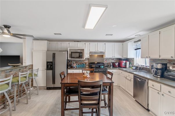 Dining room, Interior, Kitchen, Stainless Steel Appliances, Wood Texture Flooring