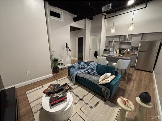 Dining room, Interior, Kitchen, Living room, Pendant Lights, Stainless Steel Appliances, Wood Texture Flooring