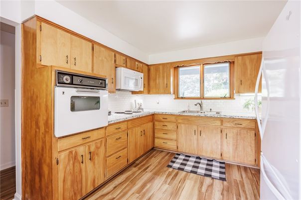 Interior, Kitchen, Tile Countertops, Wood Texture Flooring