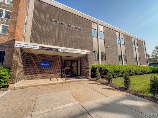 Exterior, Facade, Brick Facade, Condo Building