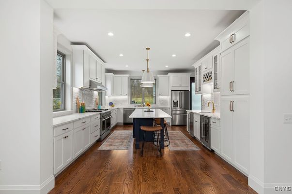 Dining room, Interior, Kitchen, Pendant Lights, Recessed Lighting, Stainless Steel Appliances, Wood Texture Flooring