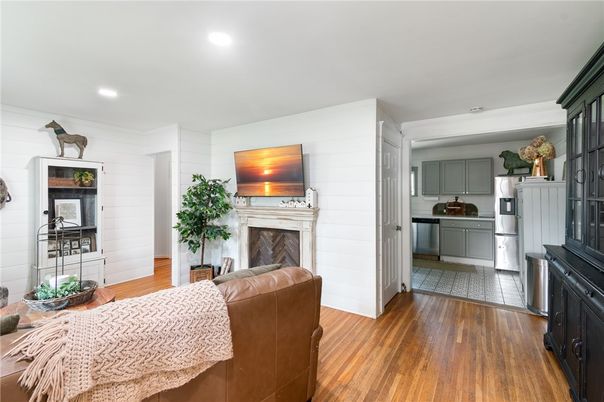 Fireplace, Interior, Kitchen, Recessed Lighting, Wood Texture Flooring