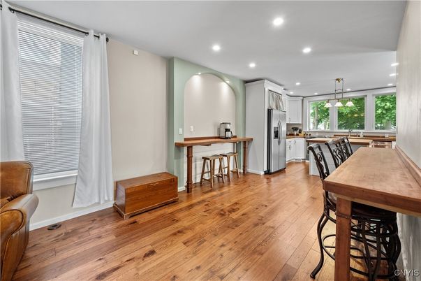 Dining room, Interior, Kitchen, Pendant Lights, Recessed Lighting, Stainless Steel Appliances, Wood Texture Flooring