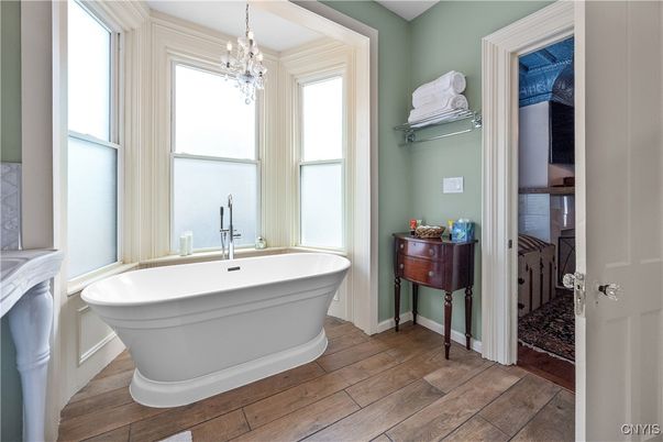 Bathroom, Chandelier, Free Standing Baths, Interior, Wood Texture Flooring