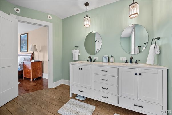 Bathroom, Dual Sink Vanities, Interior, Pendant Lights, Wood Texture Flooring